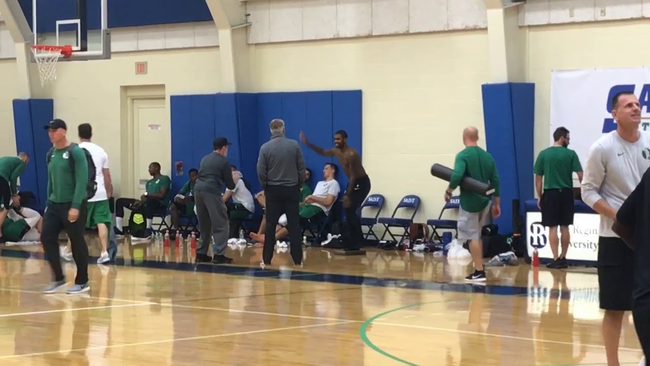 Kyrie Irving, Boston Celtics guard, does ball-handling drills at training camp