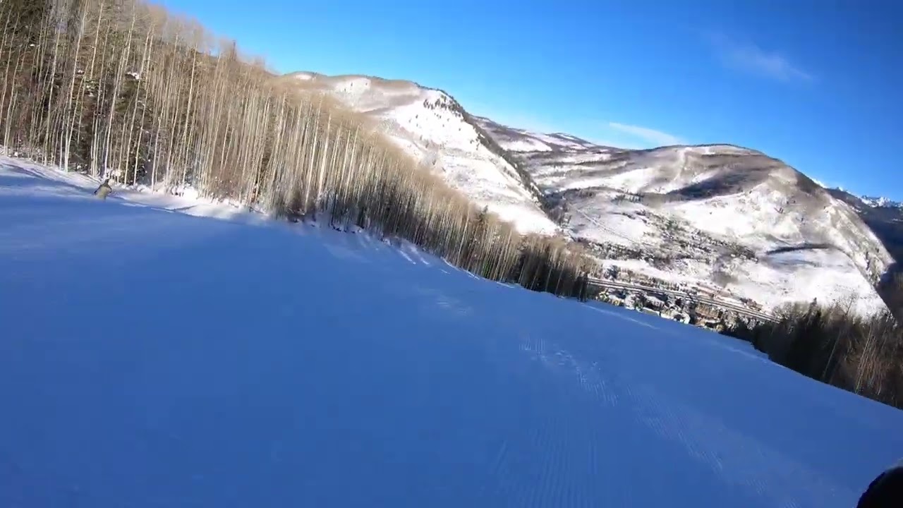Skiing Vail Simba -wide open intermediate blue downhill trail