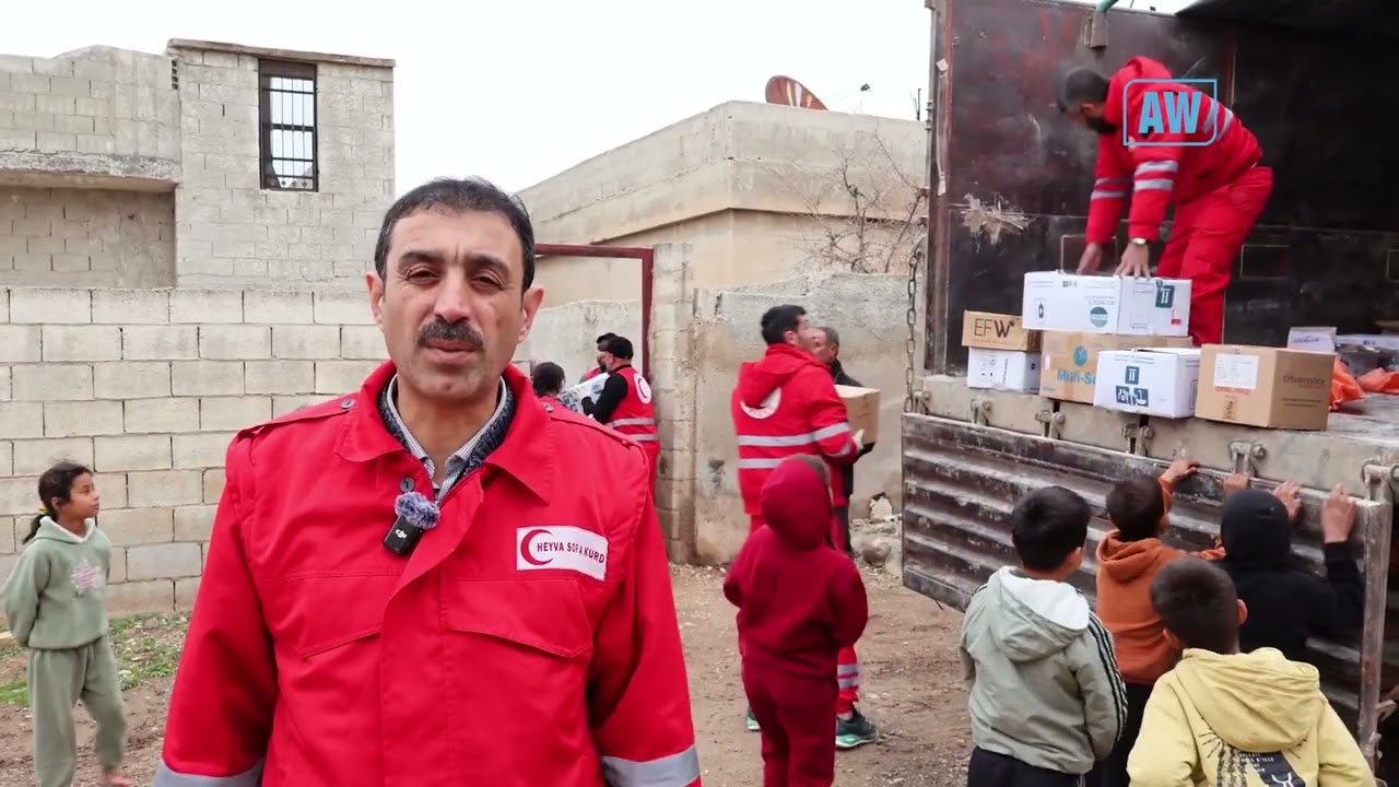 Hevya Sor a Kurd li Kobaniyê 12 qamyon alîkarî belav kir