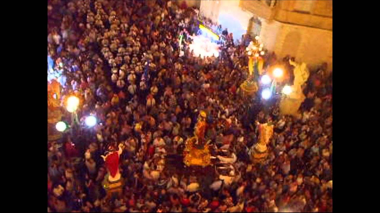 Il-festa ta' San Ġorġ ġewwa Ħal-Qormi. (Dhul tal-purcissjoni, nar, qniepen)