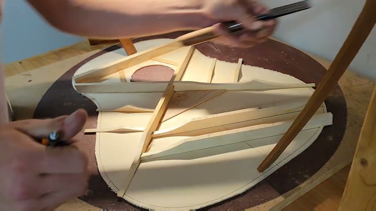 Carving guitar bracing basics.