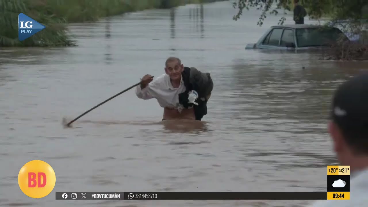 Rescate a un anciano que luchaba contra la corriente del agua en La Madrid