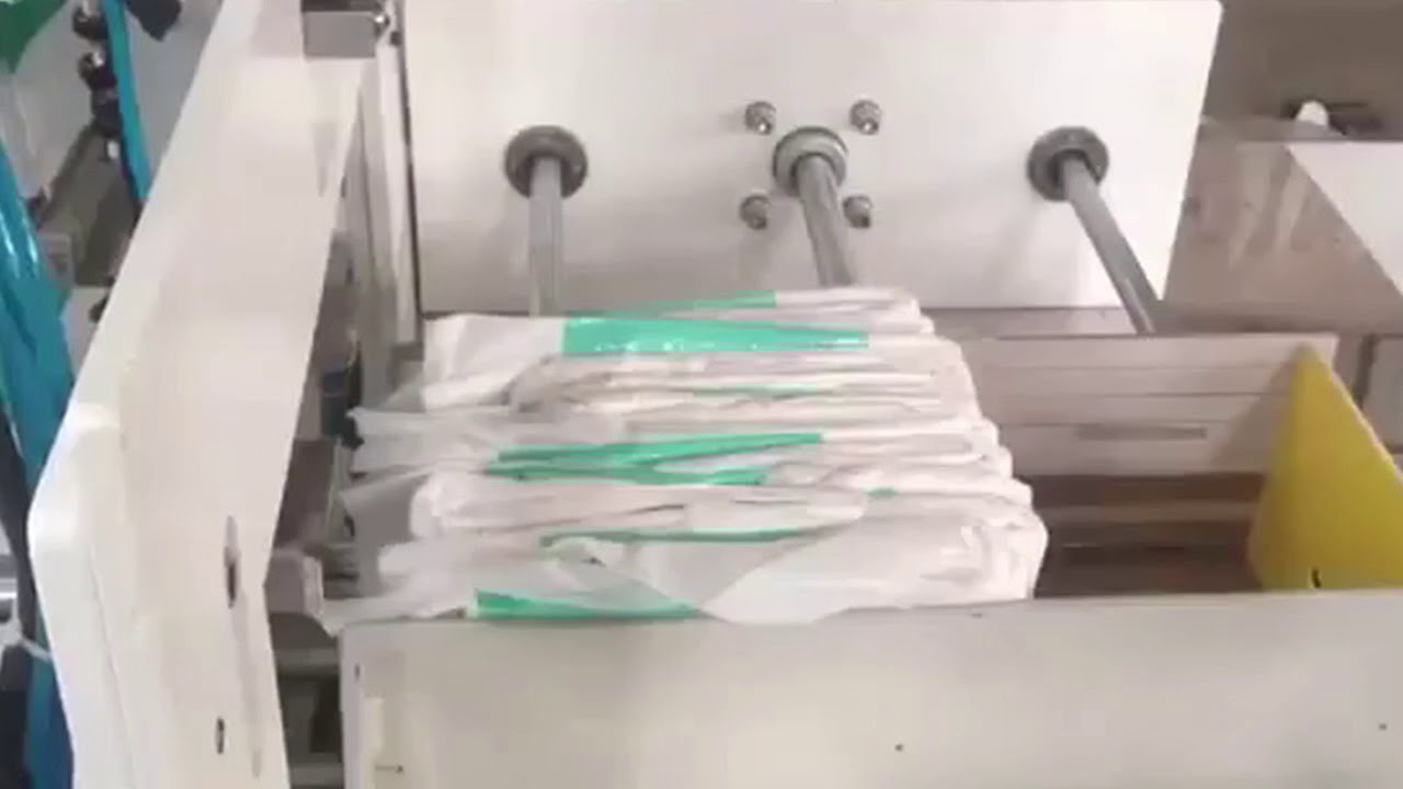 SEMI AUTOMATIC DIAPER PACKING MACHINE