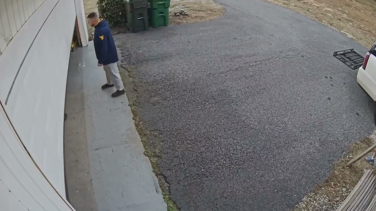 Man Hits Head on Garage Door - 1520336