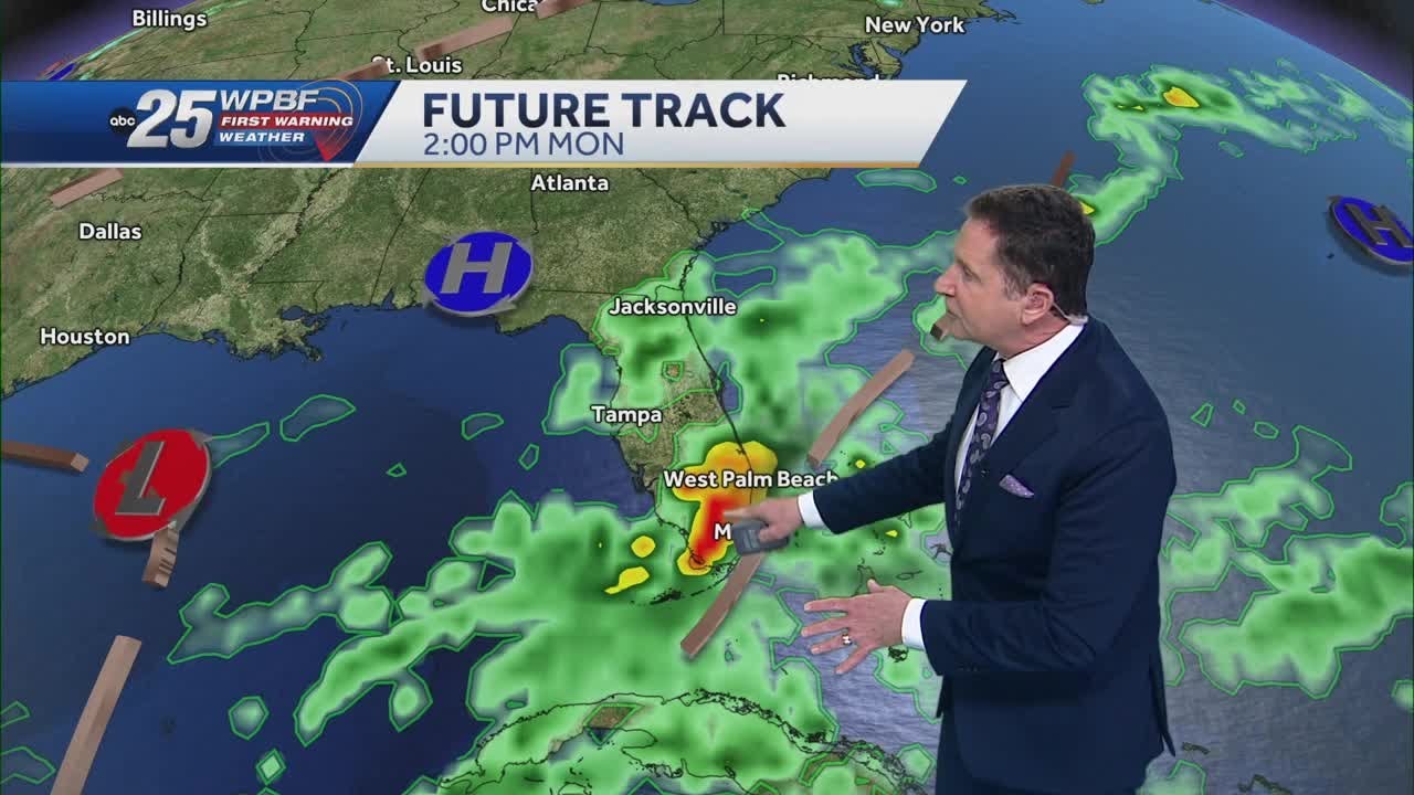 Slowly warming up with some heavy rain across South Florida