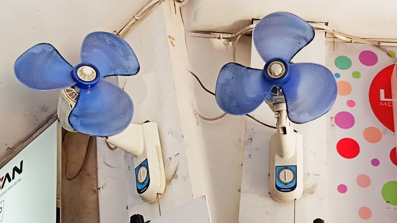 Kipas Angin Dinding Biru Tanpa Jala dan Kipas Angin Gantung Putih
