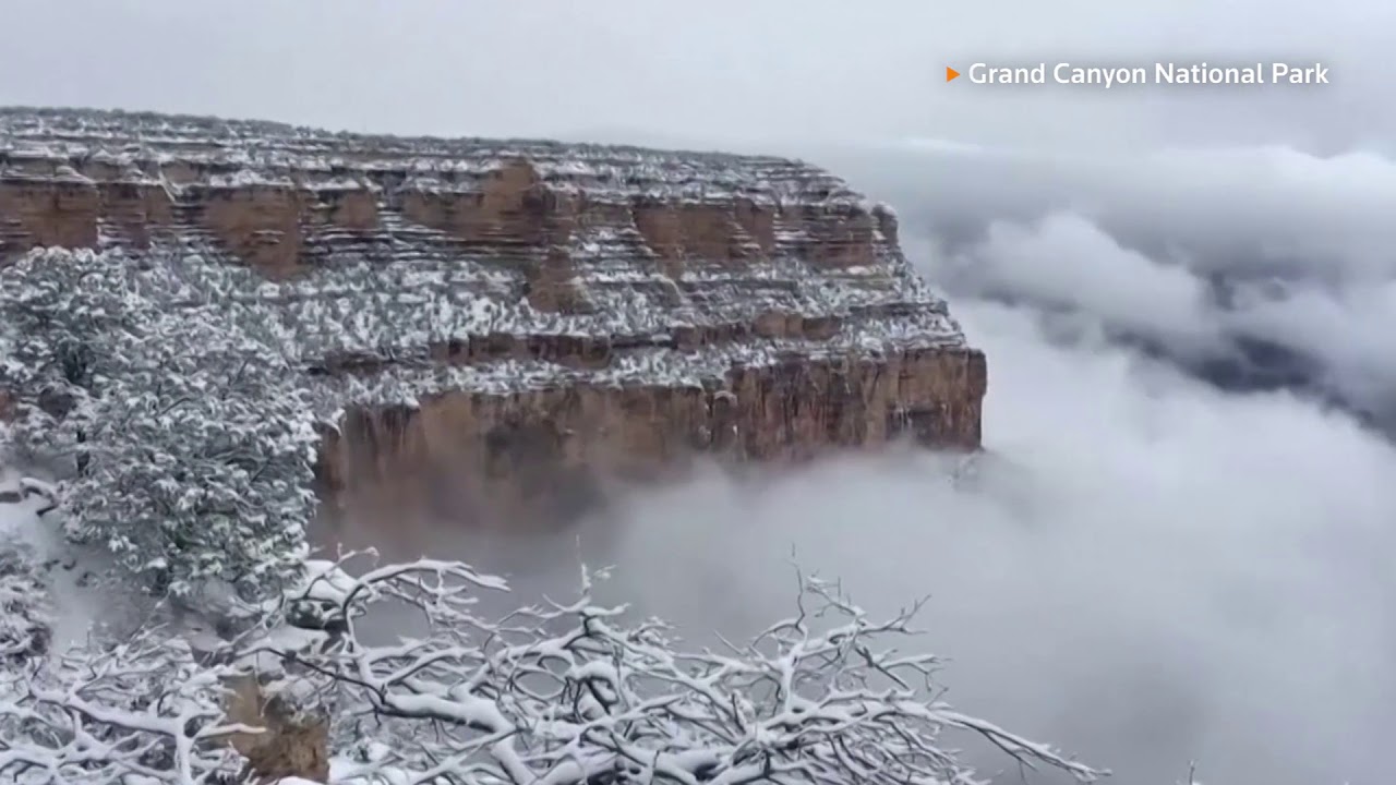 Clouds fill snow-covered Grand Canyon