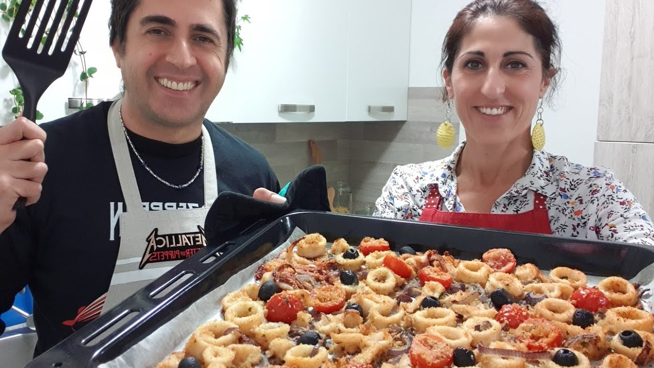 Calamari gratinati al forno con pomodorini e olive - Ricetta