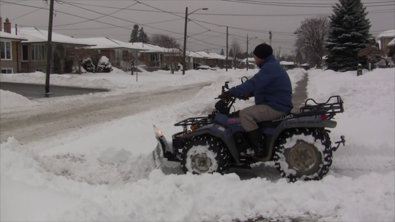 King Quad 300 Plowing Driveway