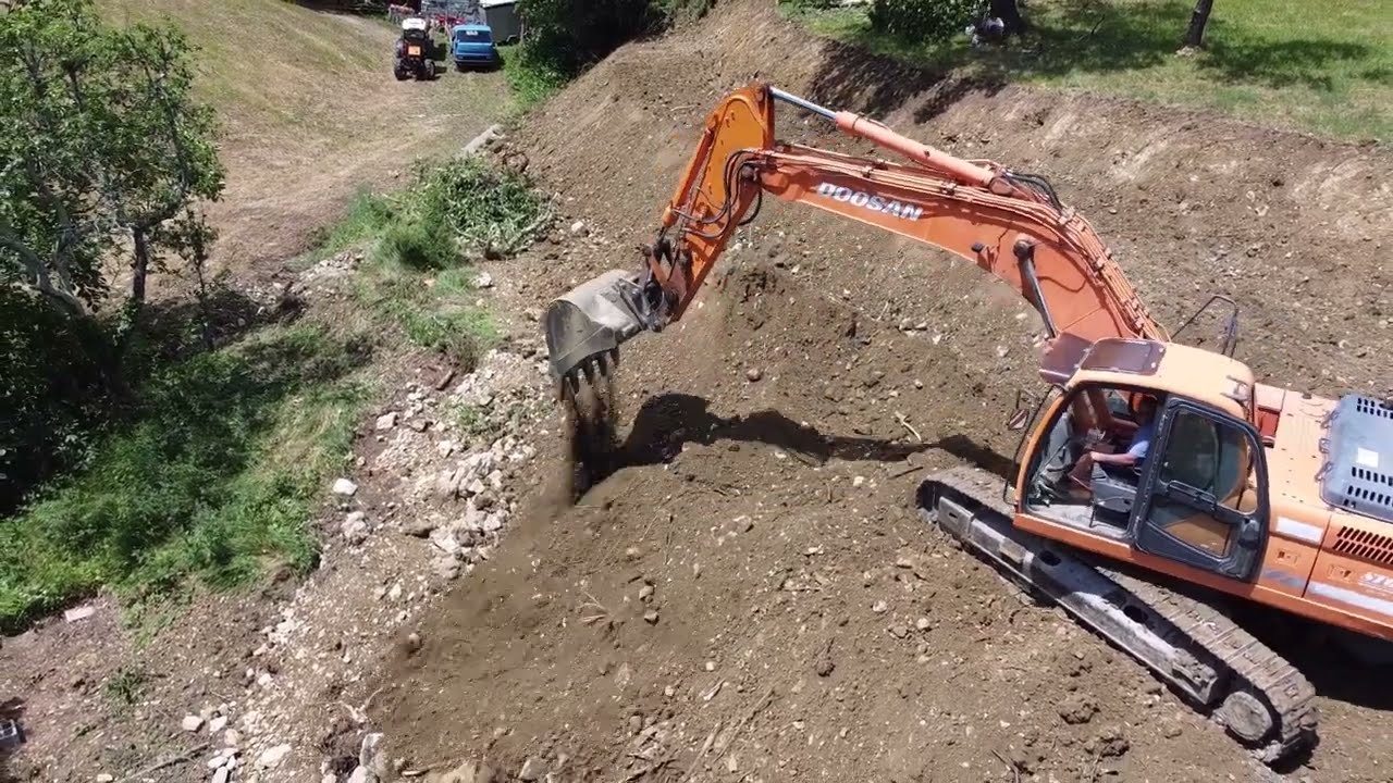 Urejanje parcele za kmetijske namene | bager doosan | Stopar PGM