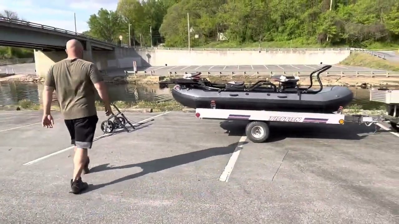 River Rat fishing raft  on a wilderness systems kayak cart