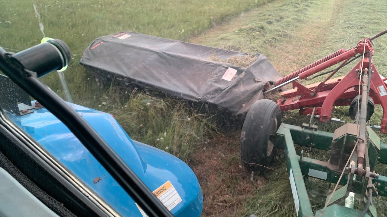 Mowing Hay-Newholland T5060 Tractor & H6750 Mower