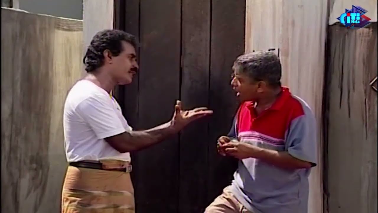 කකුල් දෙකෙන් අල්ලලා ගලේ ගහන්න සැරසෙන පොඩි මයා