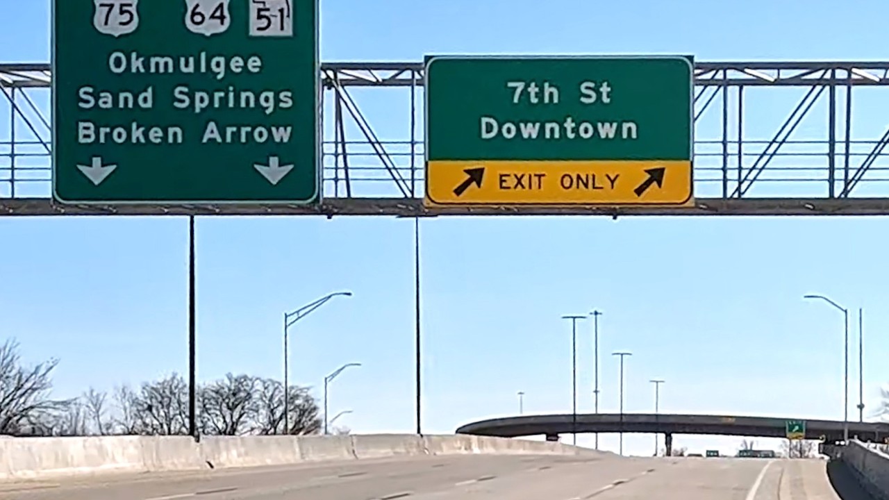 Drive through Downtown Tulsa from I-244 to the Jenks Bridge via 7th St, Denver Ave, and Riverside Dr