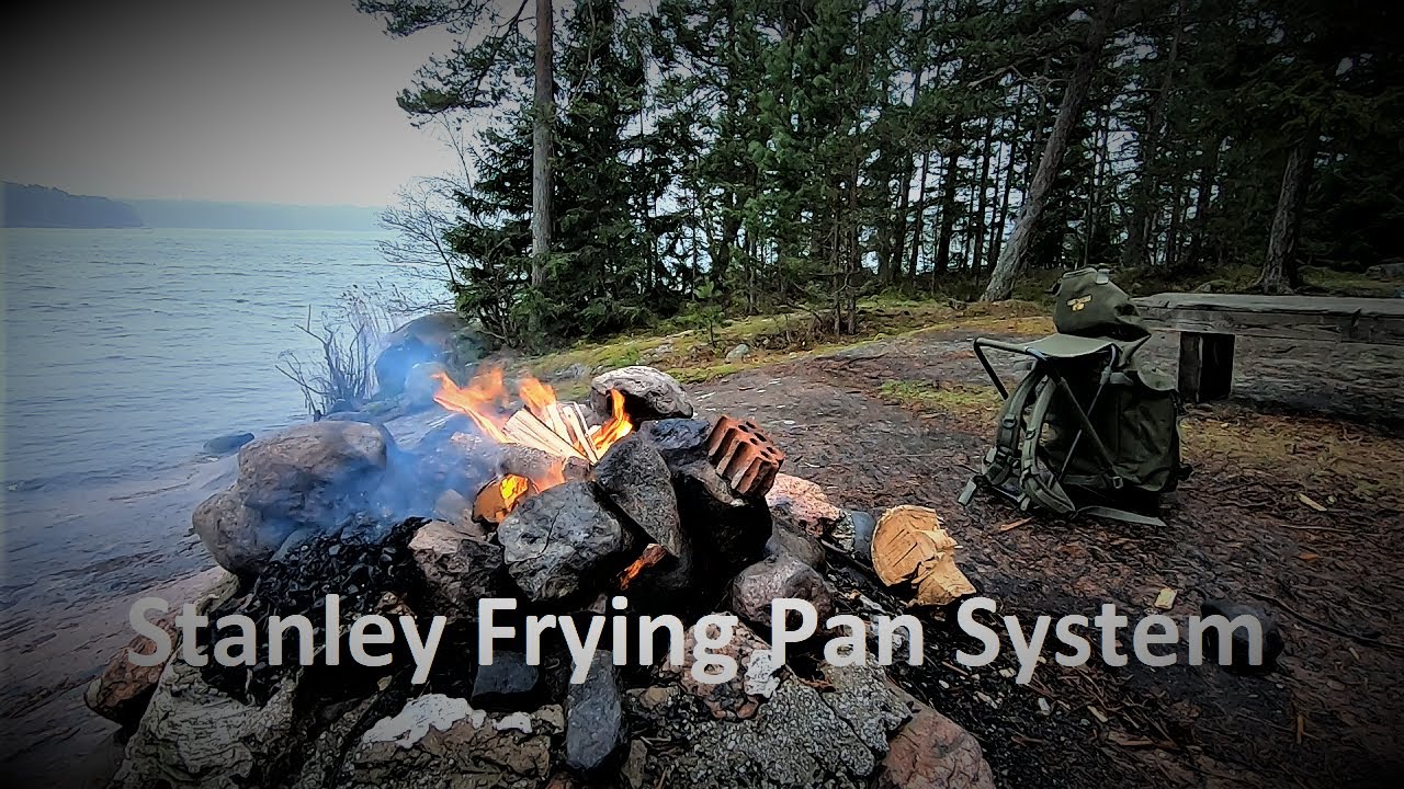 Cooking food over a campfire with Stanley Frying Pan System