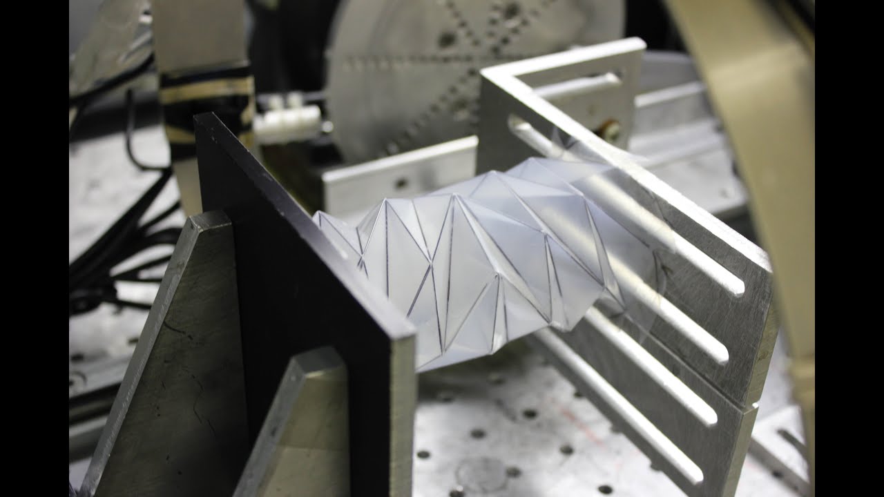 Highly Compressible Origami Bellows for Harsh Environments