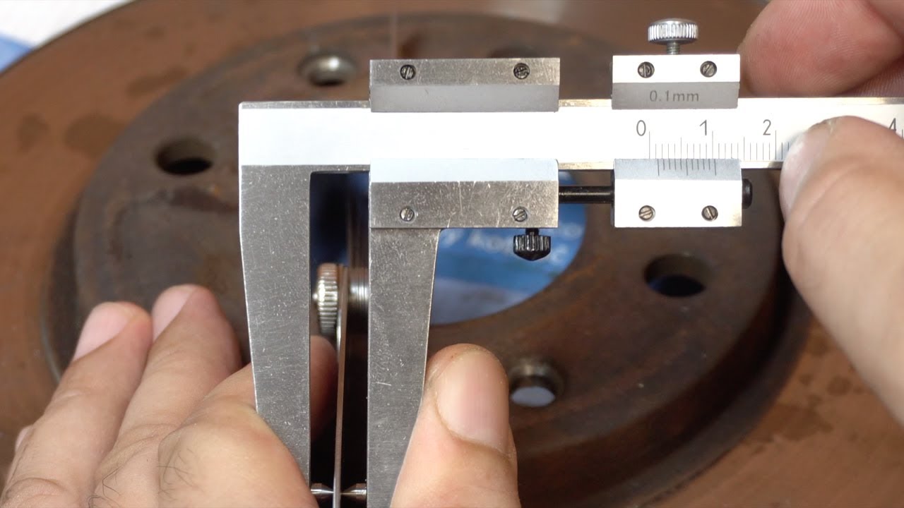 Outil indispensable pour mesurer l'épaisseur des disques de frein : Pied à coulisse spécial GENIAL !