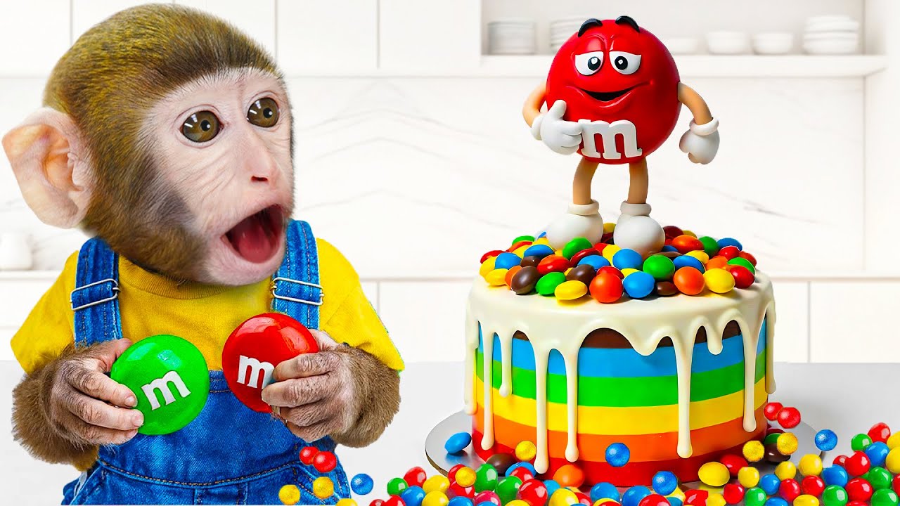 Buat kue pelangi dengan YoYo Monkey dan bebek dengan permen M&M warna-warni