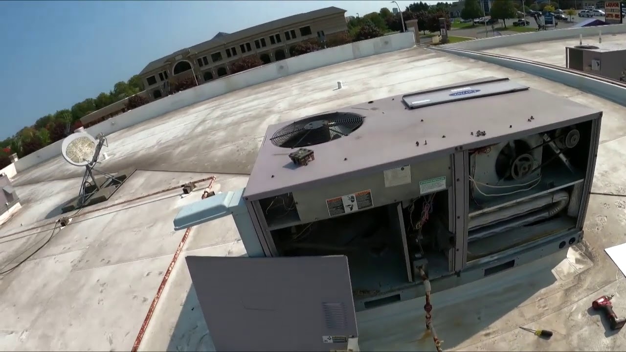 Two Carrier Roof Top Units With Bad Heat Exchangers