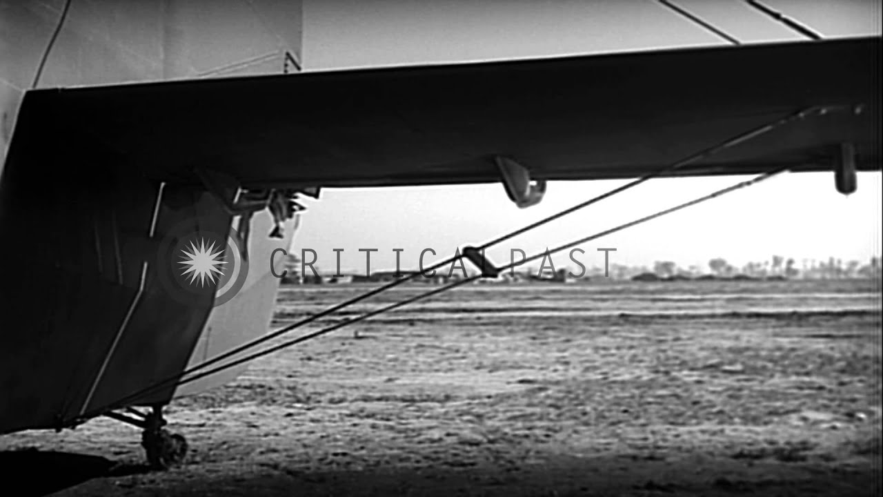 United States CG-4A glider being assembled by Repair Squadron of 81st Air Depot g...HD Stock Footage