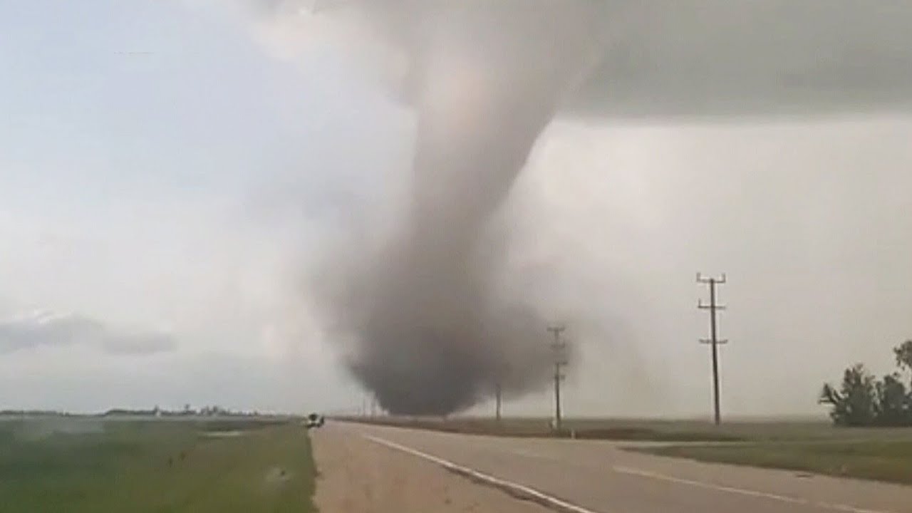 Large tornado rips through farmland in Western Manitoba