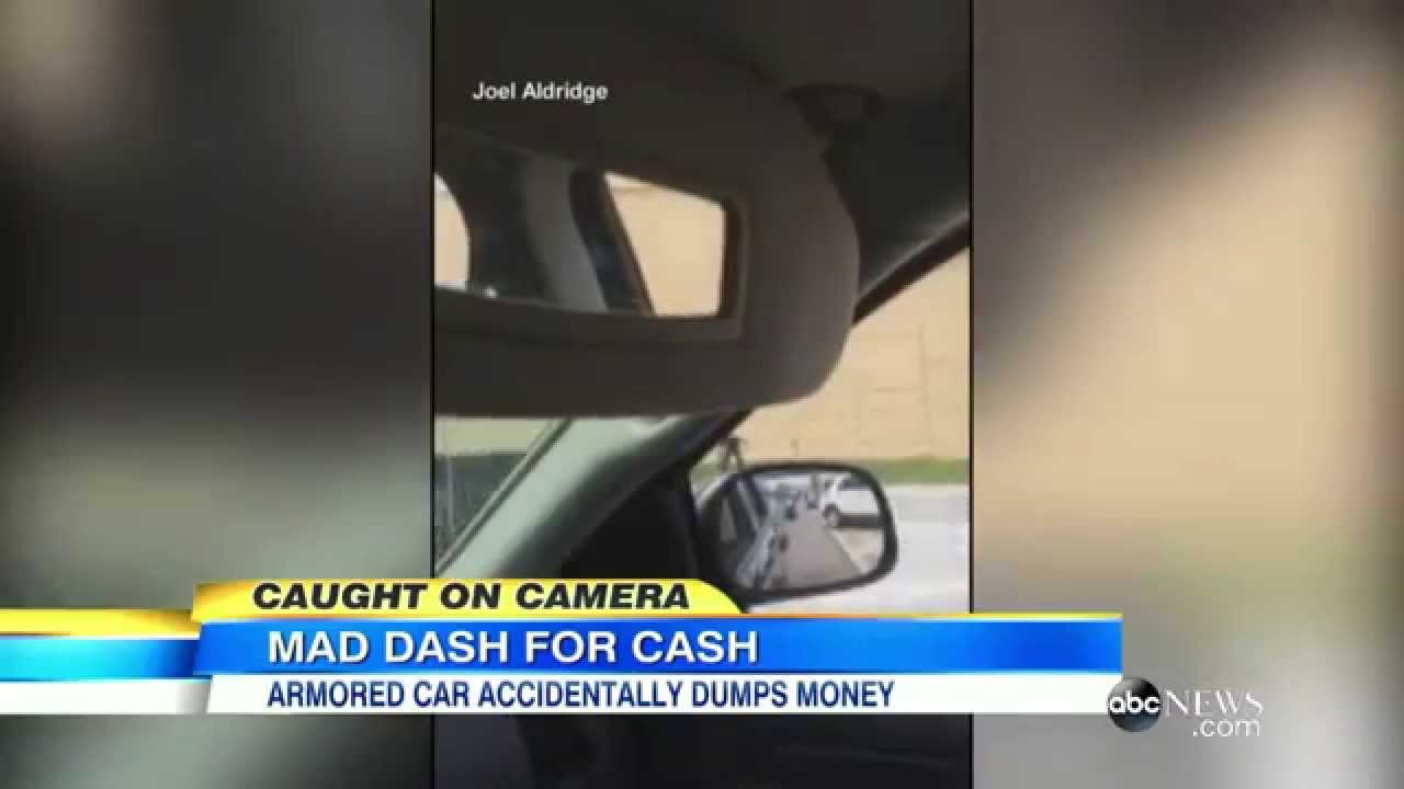 Armored Truck Dumps Cash onto Texas Highway (VIDEO)