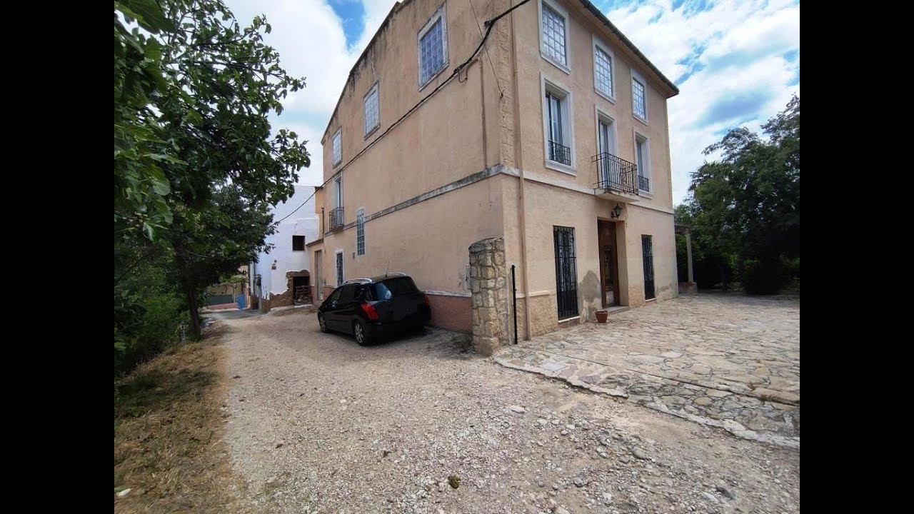 TRADITIONAL FINCA FOR SALE NEAR COCENTAINA WITH POOL, LAND, AND MOUNTAIN VIEWS