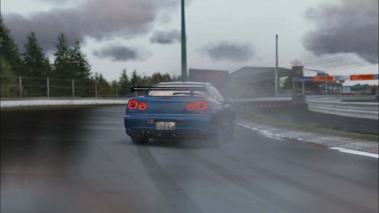 R34 GT-R with 90s sports tires in the rain