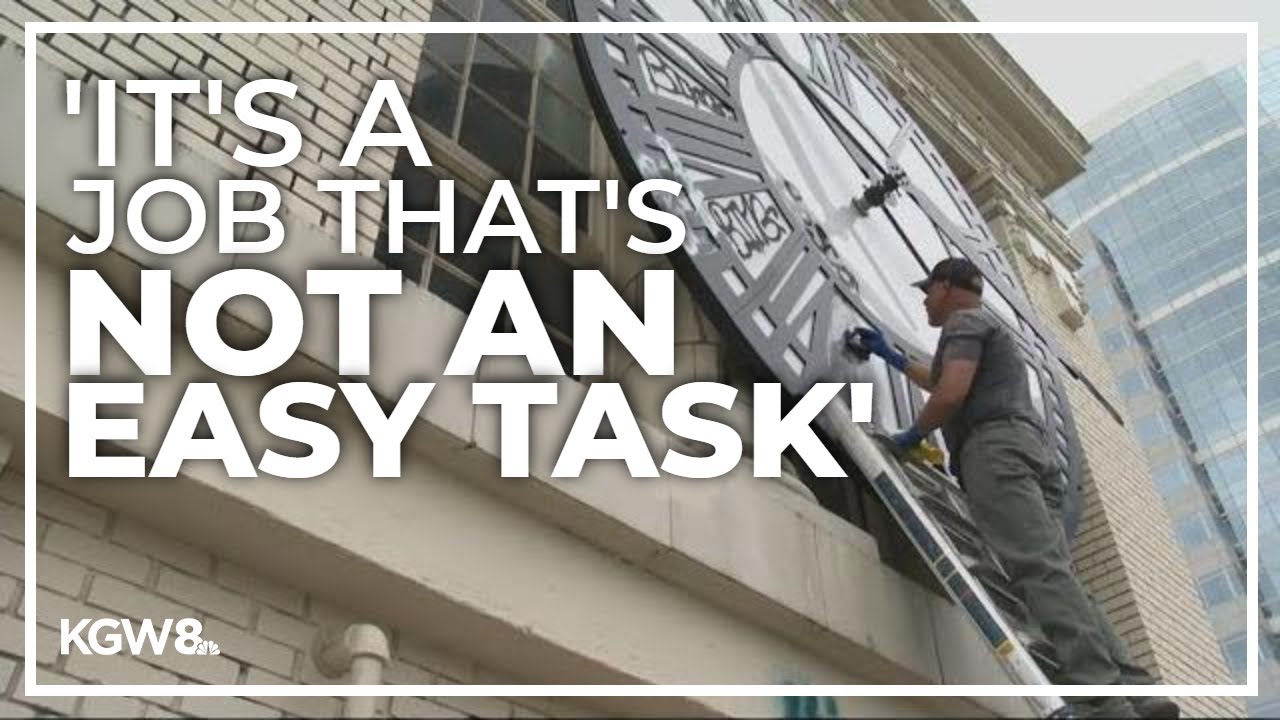 12-story building getting cleaned up from graffiti in downtown Portland