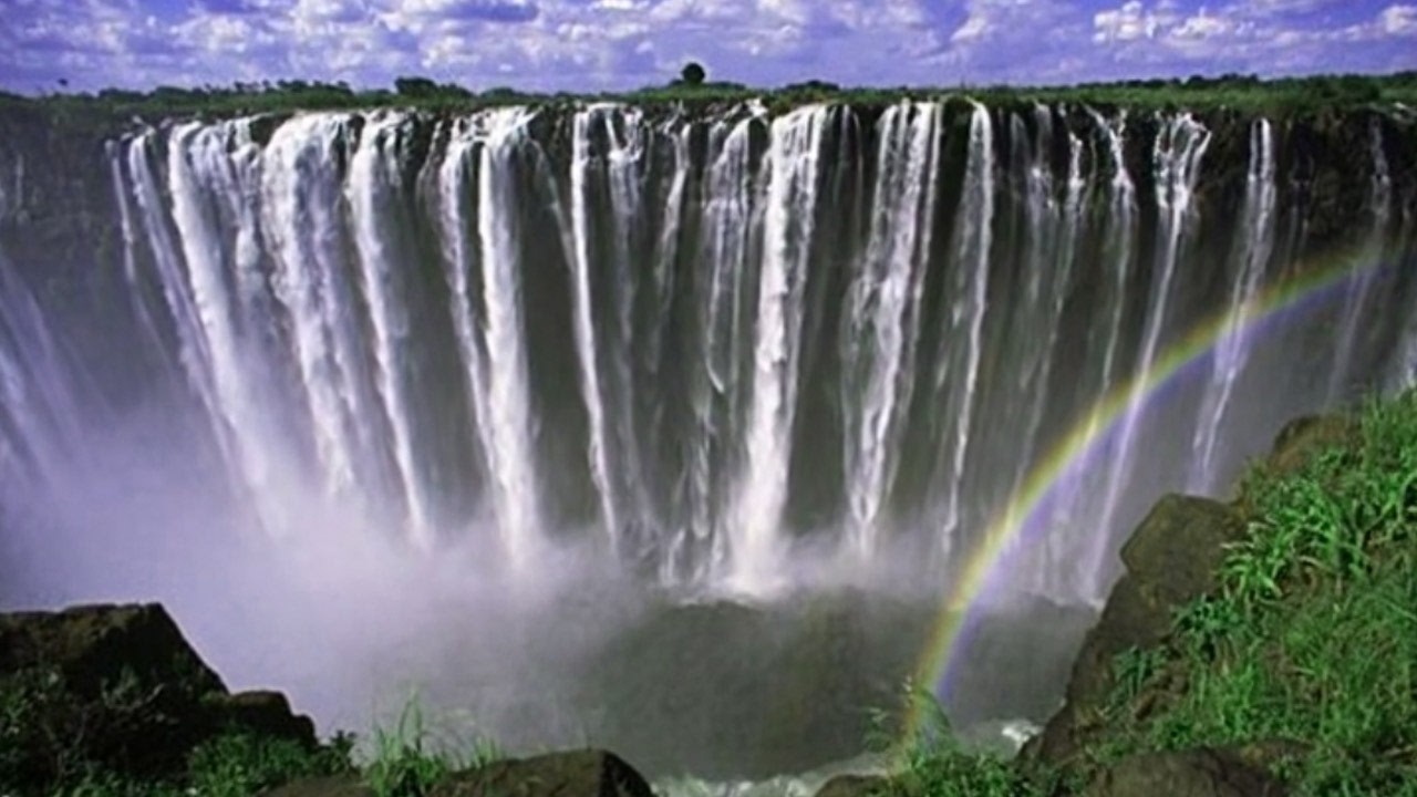 Spectacular Waterfall and Rainbow  Pure Natural Beauty
