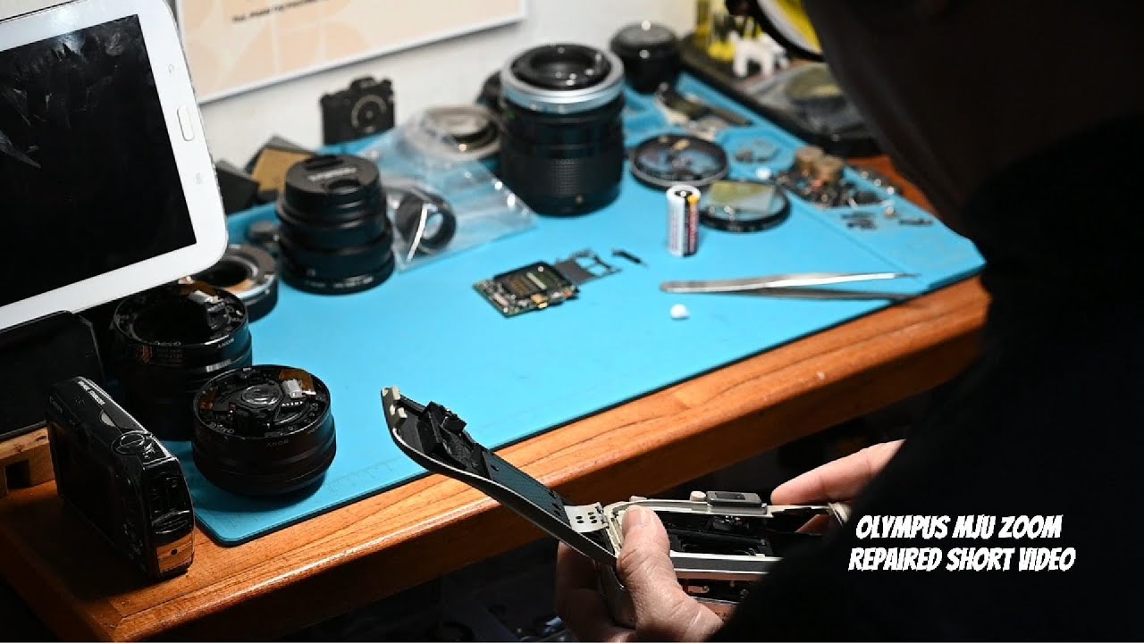 Olympus Mju Zoom repaired short video Hùng Dingo camera repair