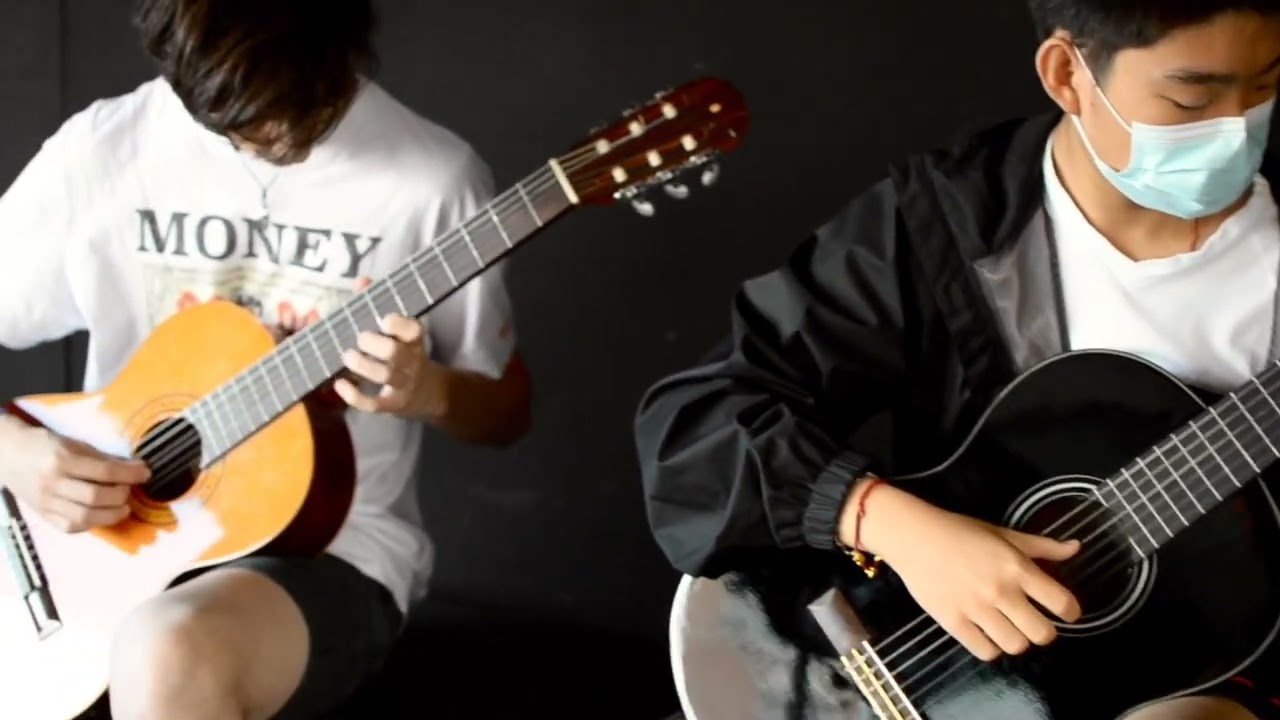 Escuela de guitarra Arcángel. 