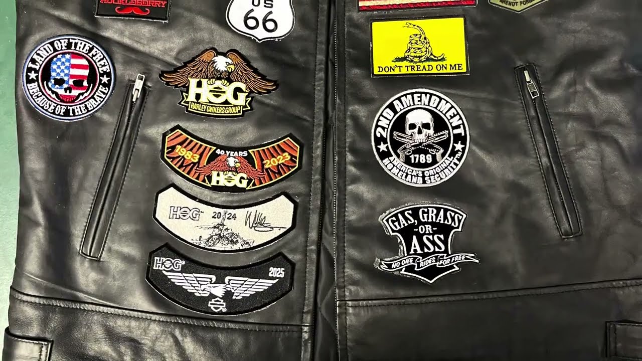 Sewing patches on a leather vest ￼