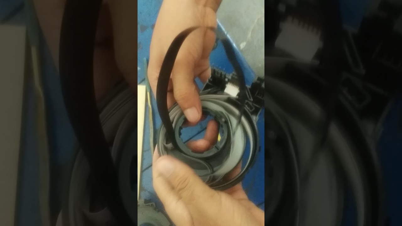 mitsubishi pajero sport clock spring how to repair
