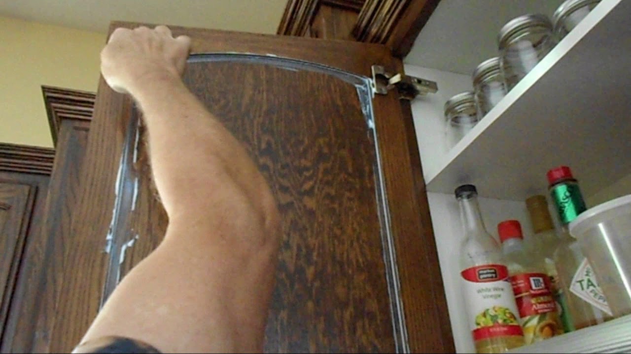 How to stop noisy resonating cabinet doors