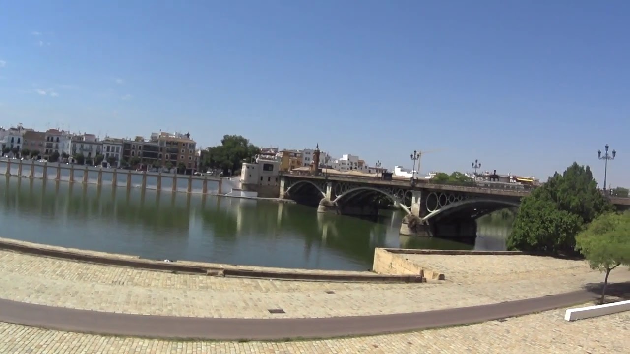Beautiful walk to the Triana Bridge or Puente de Isabel II - Seville Spain