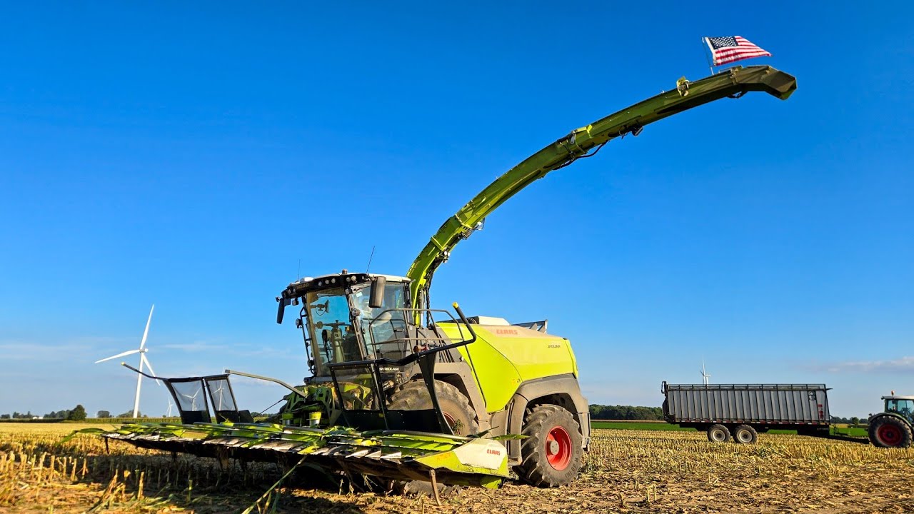 Claas Jaguar 1200 and 14 row corn head with 2 Jaguar 990's 