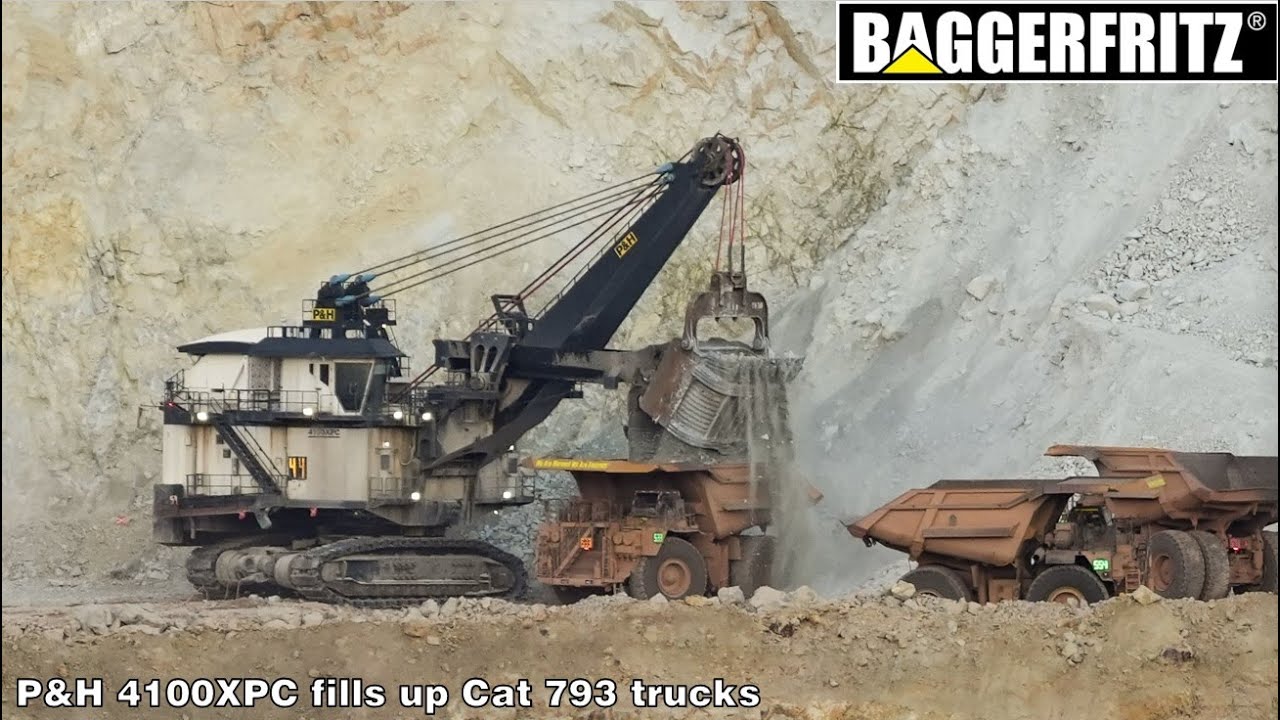 MASSIVE P&H 4100XPC shovel loads a fleet of Cat 793 trucks at Morenci copper mine