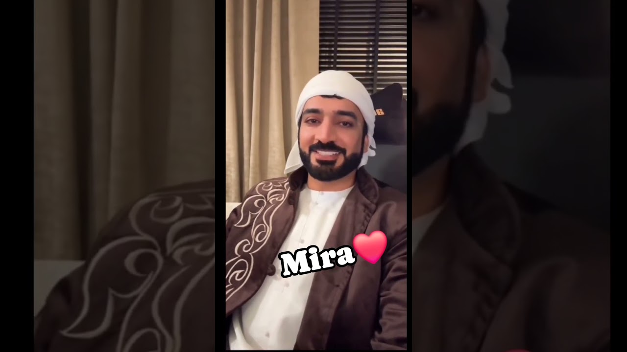 Faisal showing his gifts from the team 