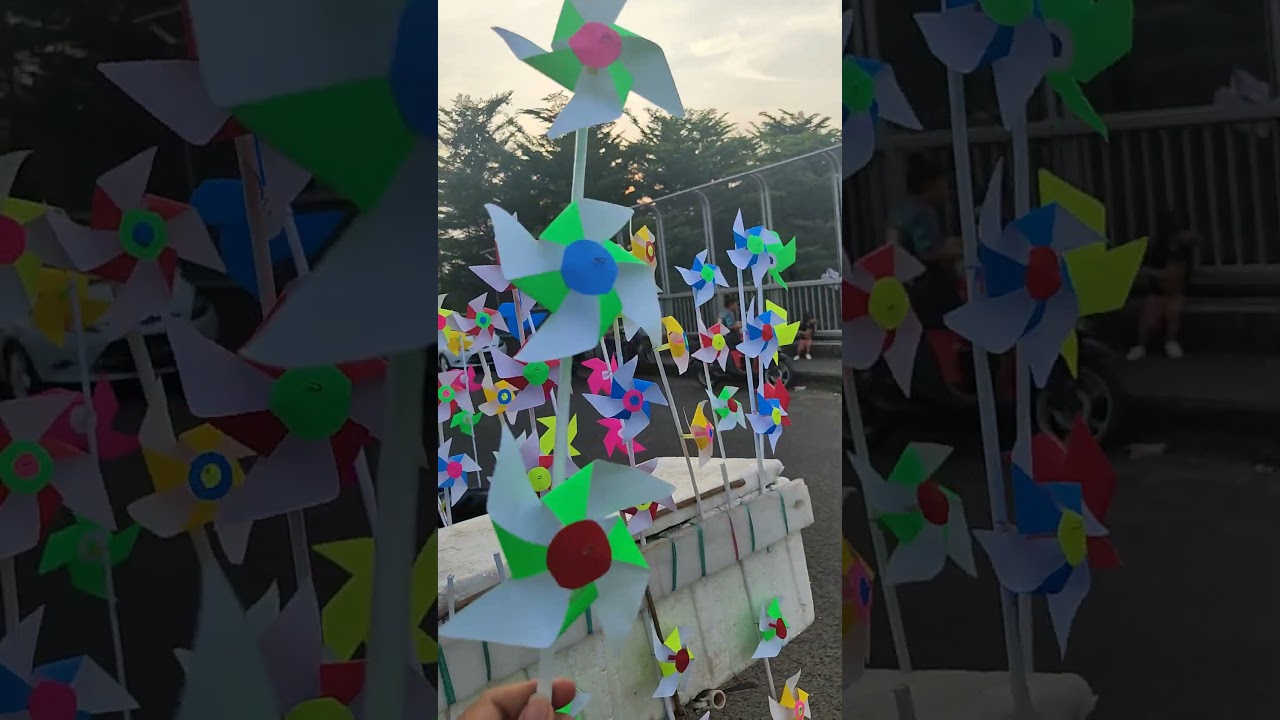 Colorful windmill spinning fast, kids cheering 🎡💨😆 #viral #fun