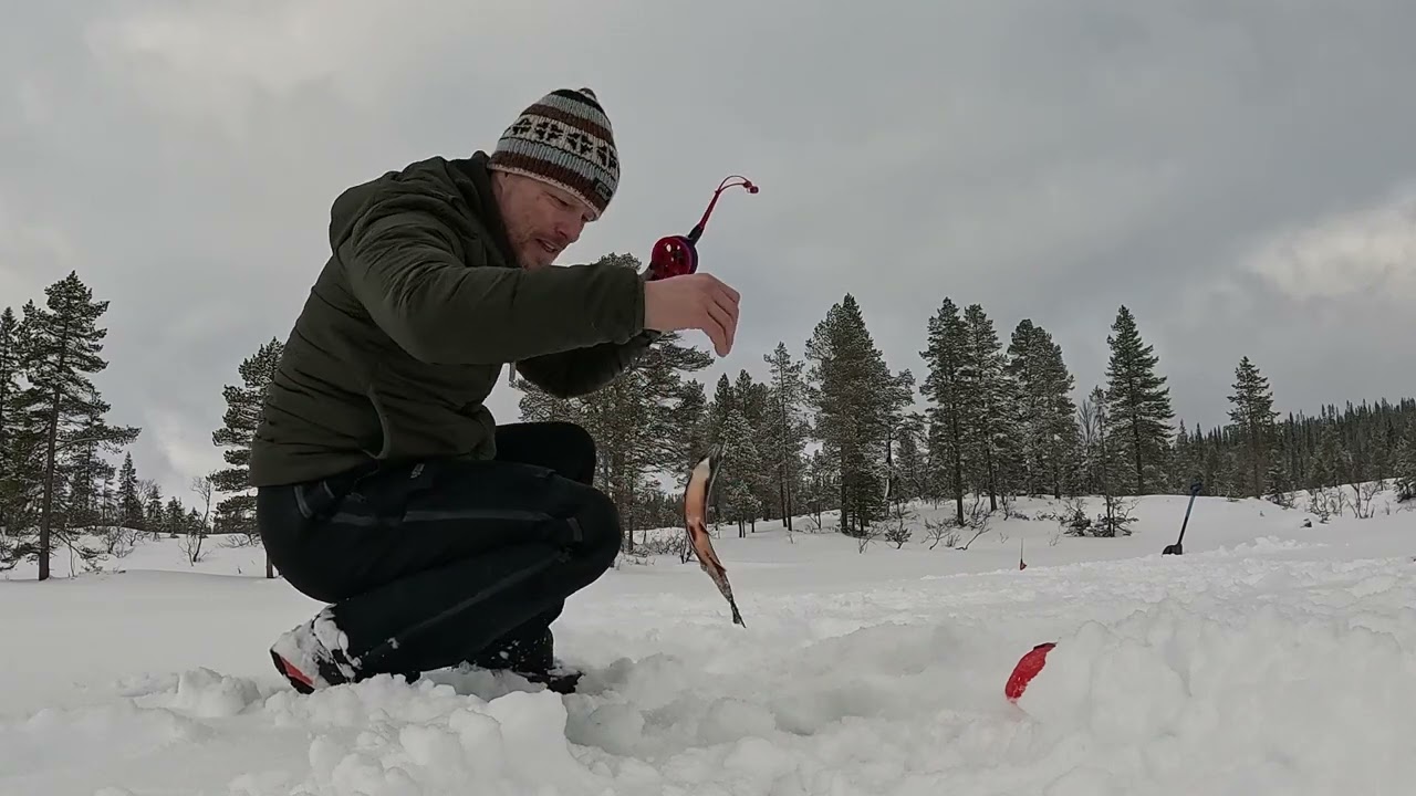 Mot stillheten på isen Isfiske på Langen