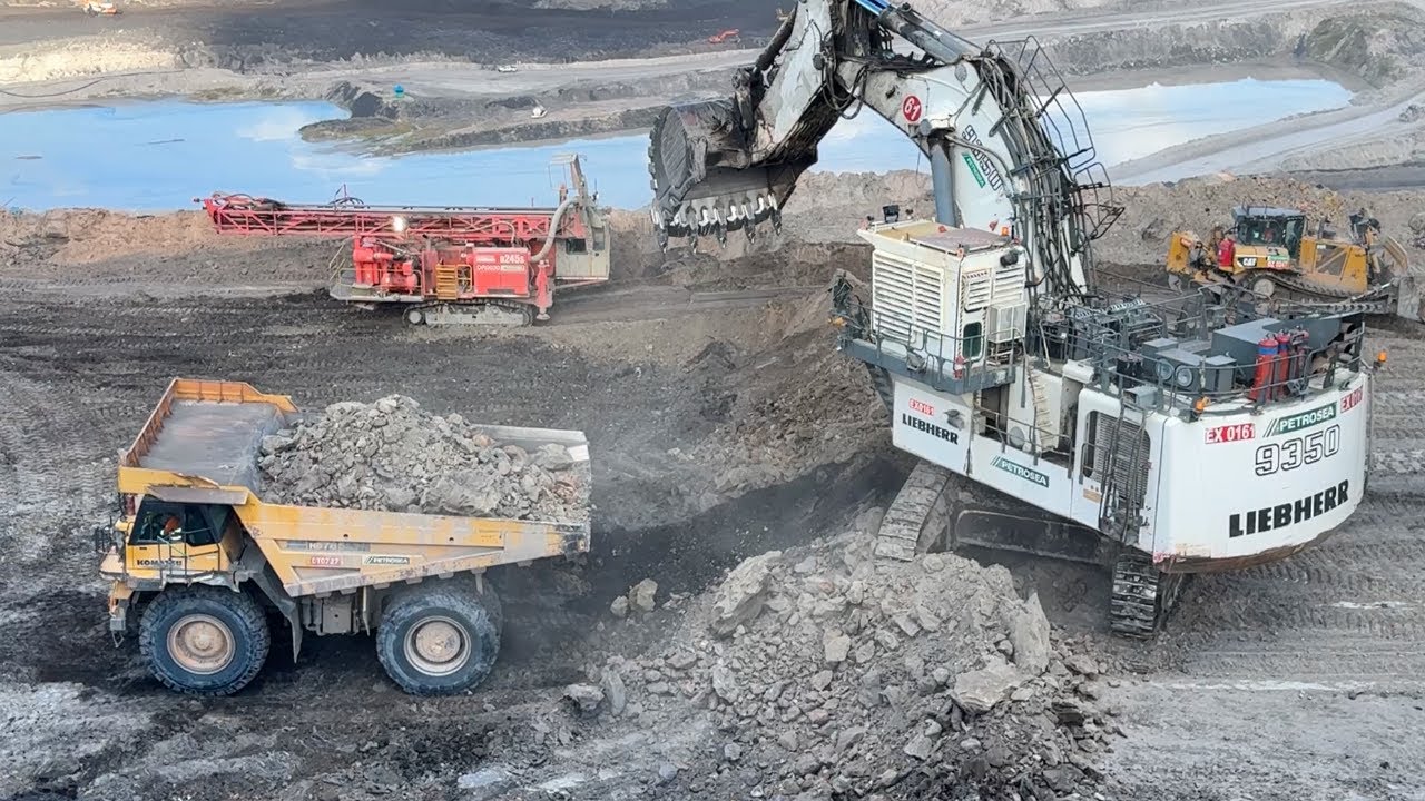 Performance Liebherr R9350 Excavator Loading Komatsu Hd 785-7 Dump truck ~ Miningstory 