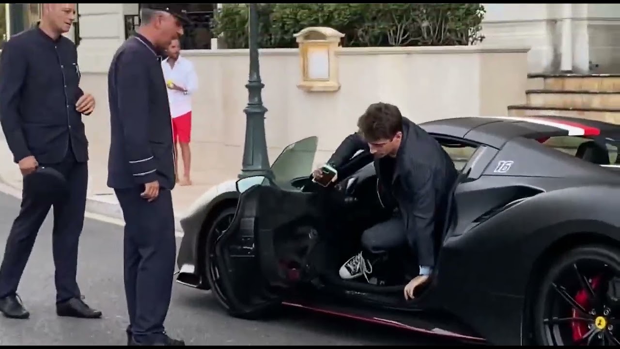 Charles Leclerc arriving in a Ferrarri at the restaurant in Monaco