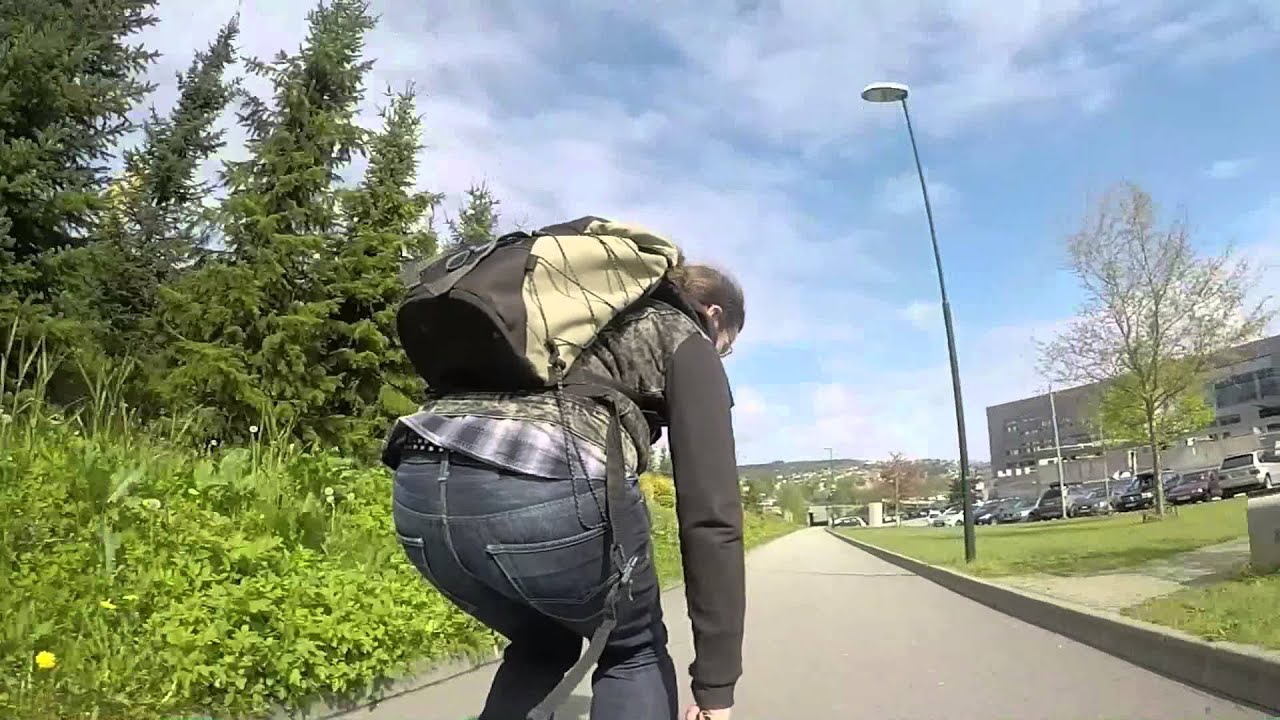 Cruising on aggressive inlineskates.