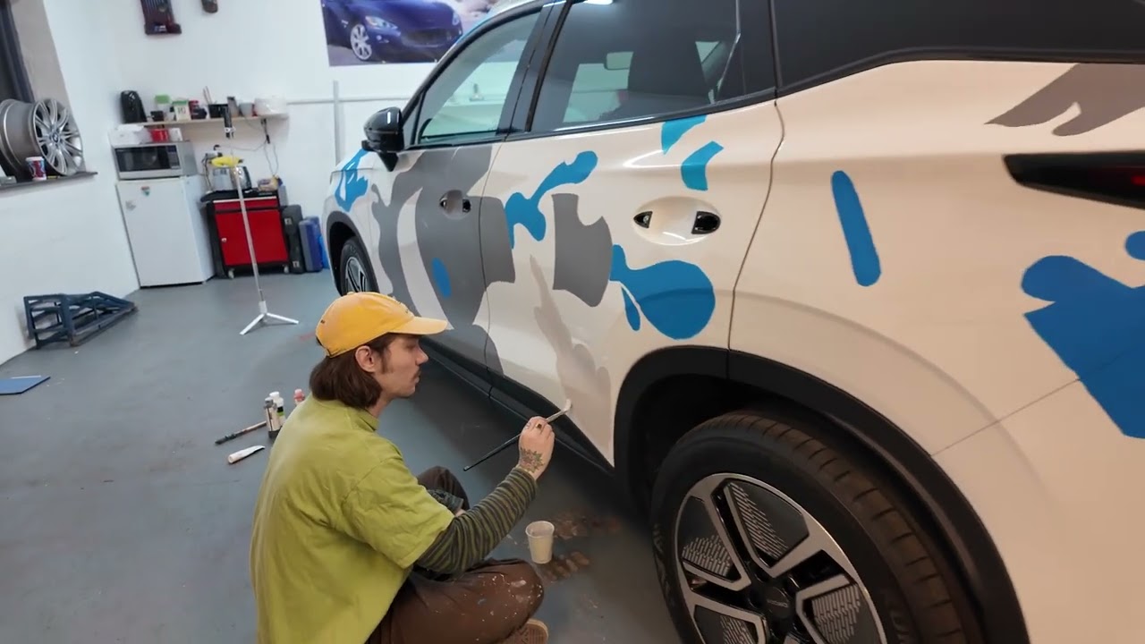 Chinese car brand OMODA cars commissioned us to HAND PAINT a brand new ART CAR for them!