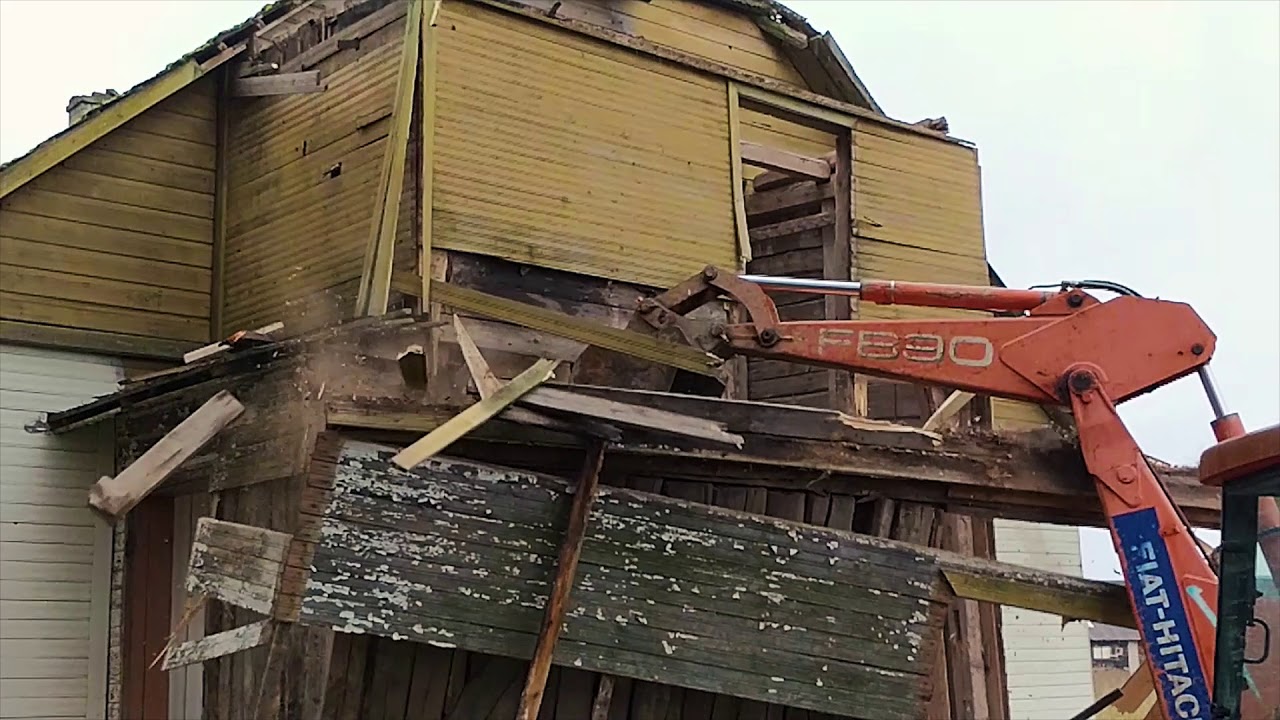 House demolition with excavator  I  Slow motion shots  I