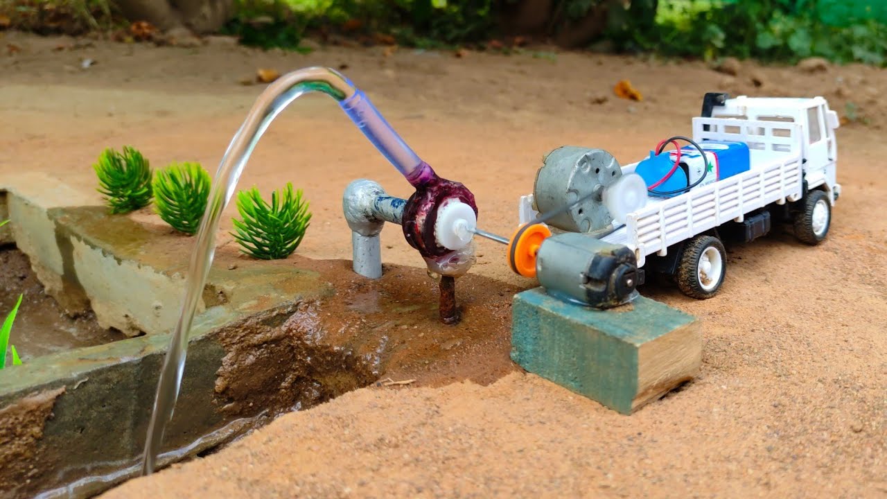 How to make water pump tractor science project - @Santroyce