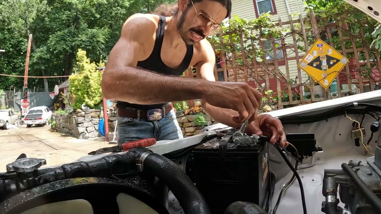 1987 Mazda B2000  changing battery terminals and fuel filter but the rain came 🌧️