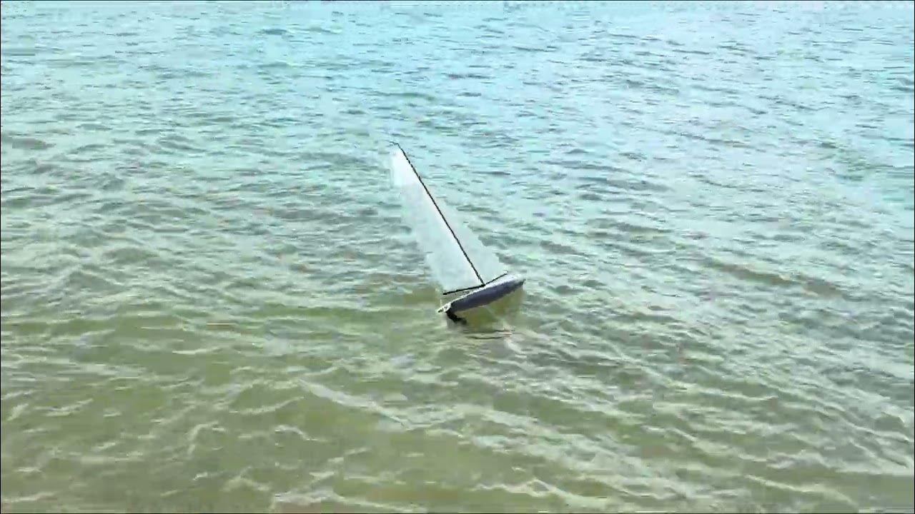 RG65 Scow Surfing the Waves in B-Rig Conditions