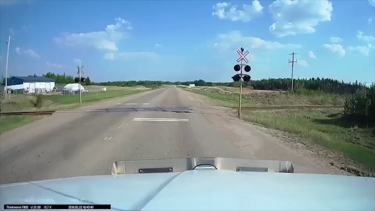 Semi VS Train (Way too close)
